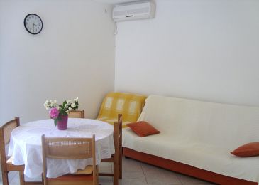 Dining room Maslinica, Dining room u smještaju tipa apartment, dostupna klima.