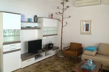 Living room Podgora, Living room u smještaju tipa apartment, dostupna klima, dopusteni kucni ljubimci i WIFI.