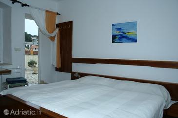 Bedroom Veli Lošinj, Bedroom u smještaju tipa room.