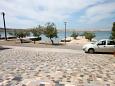 Parking lot - Apartments 4088 Parking lot Kustići (Pag) - Accommodation 4088 - Apartments near sea with pebble beach.