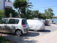 Parking lot - Apartments 5069 Parking lot Barbat (Rab) - Accommodation 5069 - Apartments near sea with pebble beach.