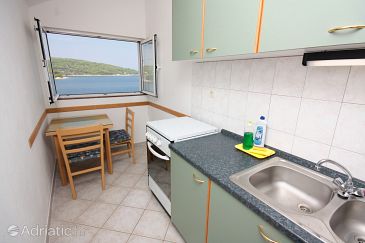 Dining room Nečujam, Dining room u smještaju tipa studio-apartment.