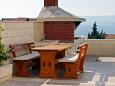 Courtyard - Apartments 5631 Courtyard Bol (Brač) - Accommodation 5631 - Apartments with pebble beach.