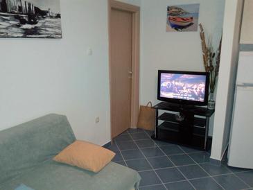 Living room Sutivan, Living room u smještaju tipa apartment.