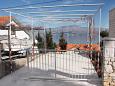 Parking lot - Apartments 6049 Parking lot Postira (Brač) - Accommodation 6049 - Apartments with pebble beach.