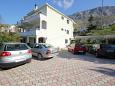 Parking lot - Apartments 8667 Parking lot Dugi Rat (Omiš) - Accommodation 8667 - Apartments with pebble beach.